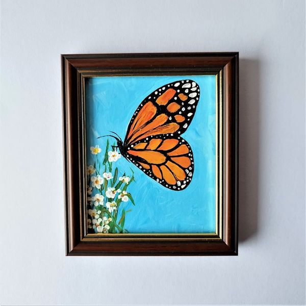 Handwritten-a-monarch-butterfly-sits-on-a-wildflower-by-acrylic-paints-7.jpg