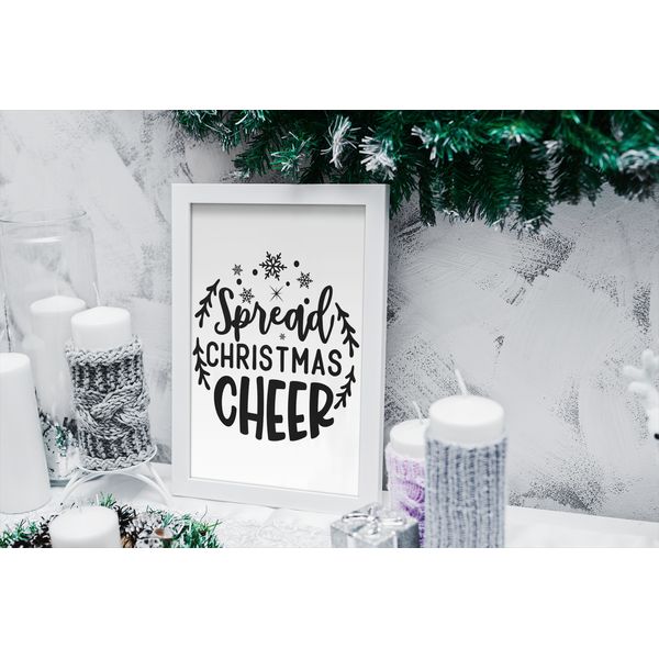 mockup-of-an-art-print-surrounded-by-christmas-candles-2091-el.png