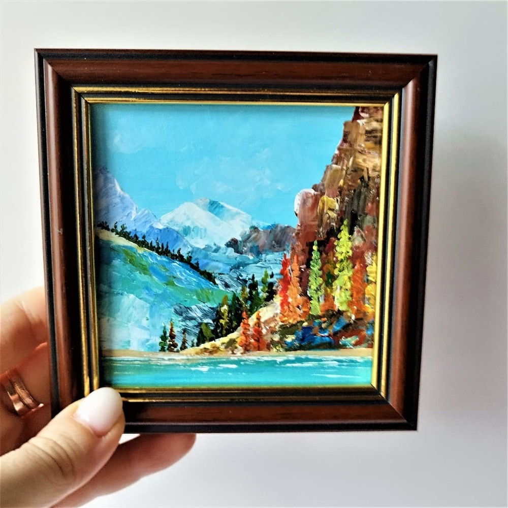 Handwritten-lake-among-the-autumn-forest-and-mountains-by-acrylic-paints-.jpg