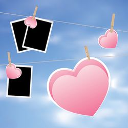 Retro photo frame and hearts on a rope with pegs
