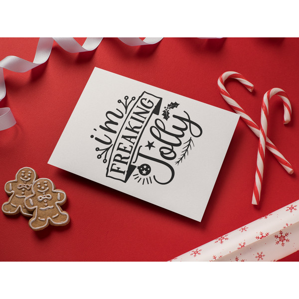 christmas-card-mockup-with-gingerbread-men-and-candy-canes-23819.png