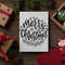 christmas-holiday-greeting-card-mockup-with-gift-boxes-and-santa-ornament-23824.png