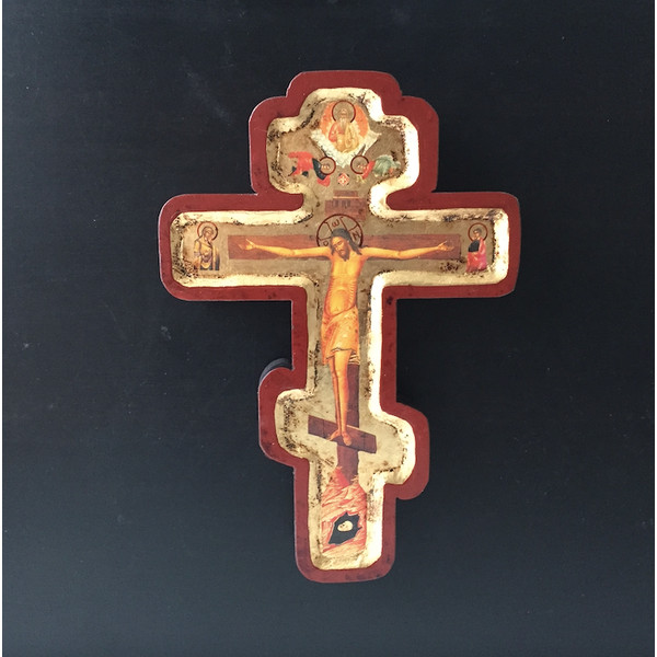The cross with a Crucifix is 24 x 17 x2 cm