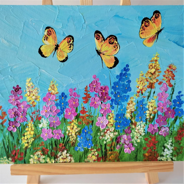 Handwritten-three-small-yellow-butterflies-fly-over-wildflowers-by-acrylic-paints-1.jpg