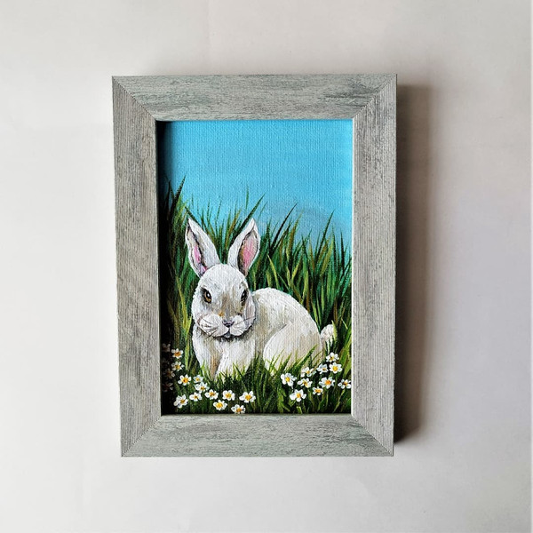 Handwritten-impasto-style-a-white-rabbit-is-sitting-in-a-clearing-by-acrylic-paints-3.jpg