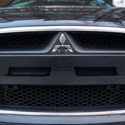 Mitsubishi Lancer X restyling front grille EVO style
