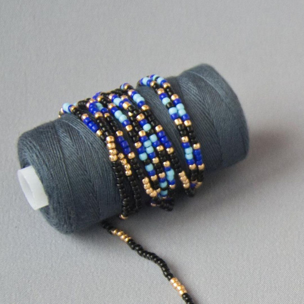Beads strung on a thread.jpg