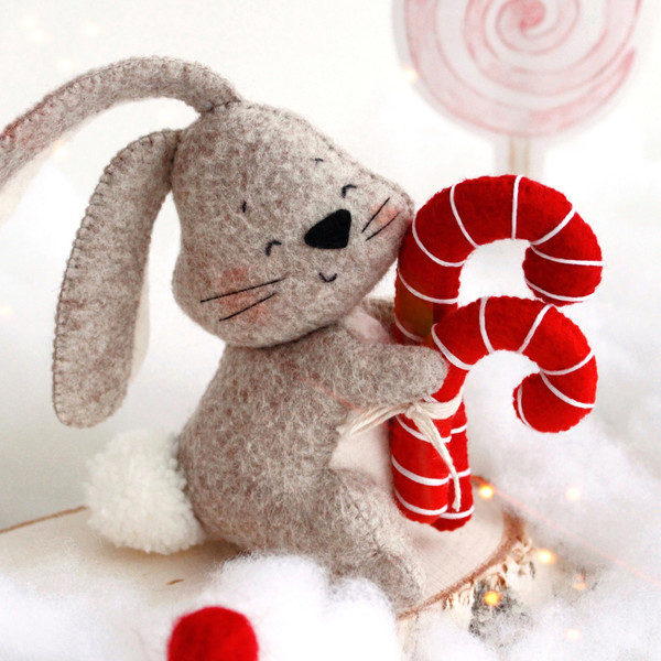Felt toys - bunny with Christmas red candies on the side