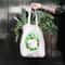 white-cat-in-plants-cotton-tote-bag-.jpg