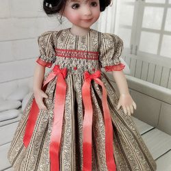 Smocked dress with hand embroidery for Little Darling dolls in brown tones