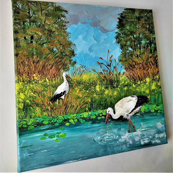 Handwritten-two-storks-on-a-swamp-landscape-by-acrylic-paints.jpg