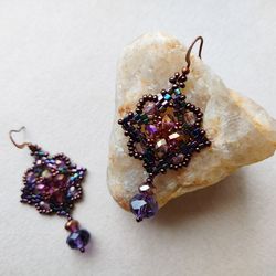 Purple crystal earrings with sparkling beads in a boho style