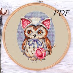 cross stitch owl with a lollipop cross stitch patterns design for embroidery pdf