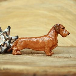 Brooch Wire-haired red dachshund figurine - brooch or dog show ring clip/number holder, cast plastic, hand-painted