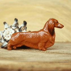 Brooch long haired red dachshund figurine - brooch or dog show ring clip/number holder, cast plastic, hand-painted