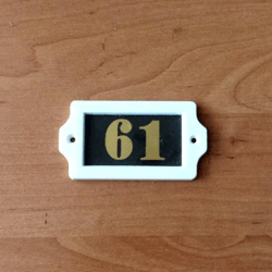 Number sign 61 - plastic vintage apartment address door plate