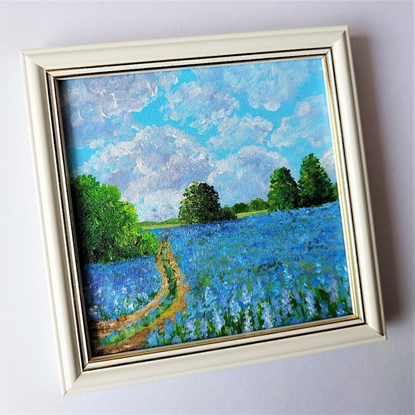 Painting-landscape-nature-field-of-wildflowers-and-trees-art-in-a-frame