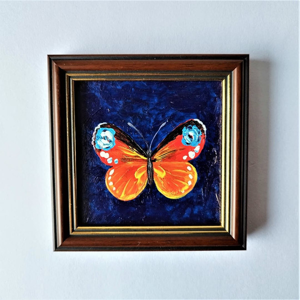 Textured-painting-orange-butterfly-on-blue-background-impasto-art.jpg
