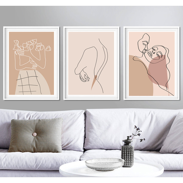 3 beige prints on the wall on the theme of love