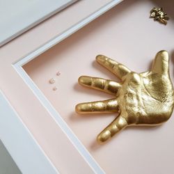 casts of babies hands and feet