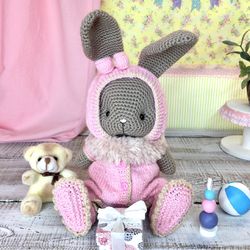 Cute stuffed plush bunny in overalls