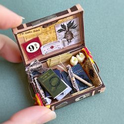 Miniature doll set with a suitcase with magic books for playing in a dollhouse, scale 1:12, polymer plastic