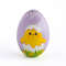 wooden Easter egg with a painted hatched chick