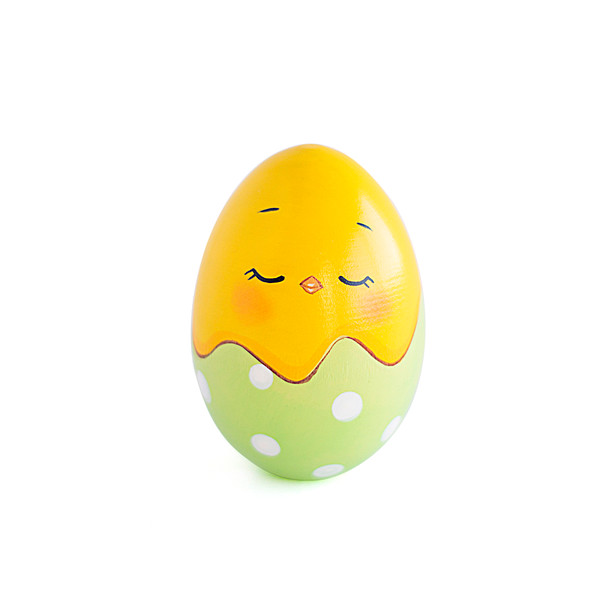 wooden egg hatched chick in a light green shell