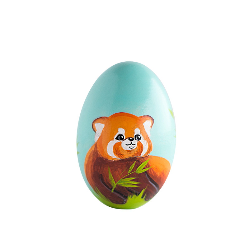 cute red panda on a painted wooden egg