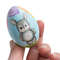 cute bunny with balloons painted on painted wooden egg