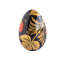 Russian wooden painted egg Khokhloma red strawberries and golden leaves on a black background