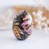 russian easter wooden egg hand painted pink peonies and golden leaves on black background