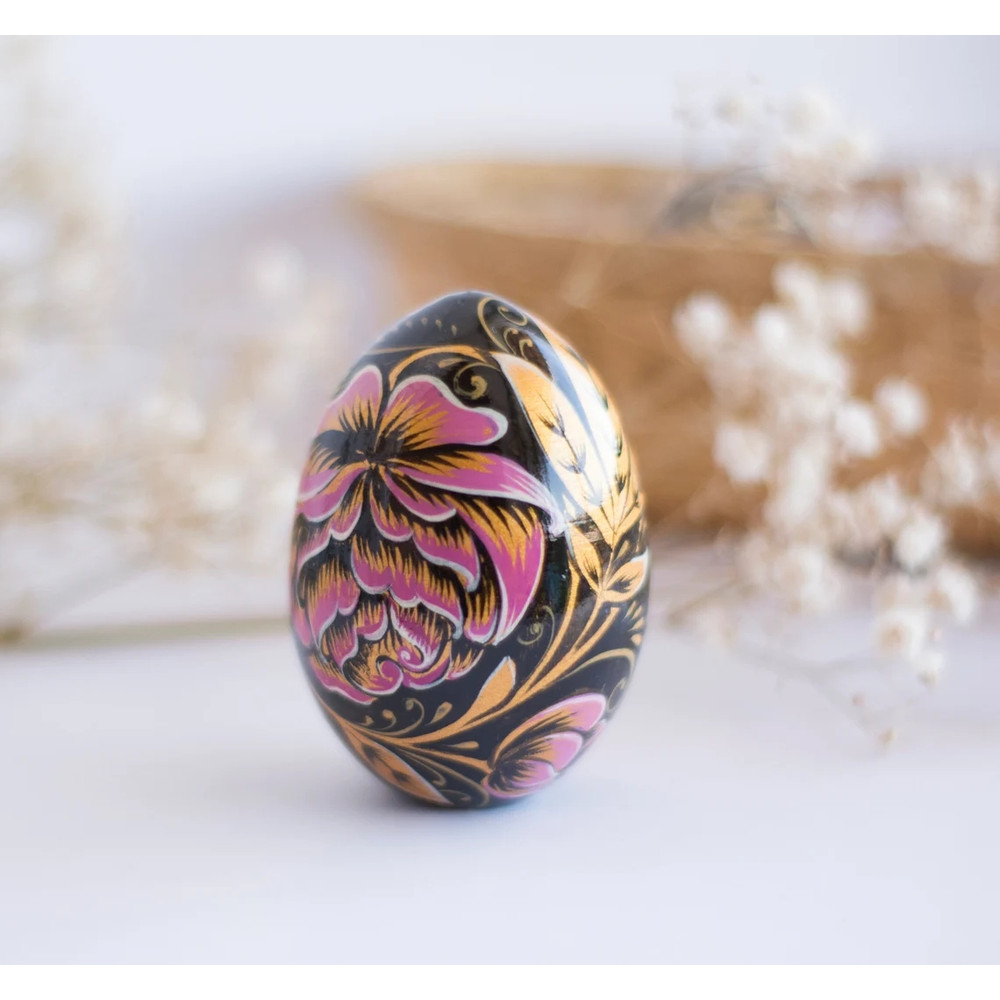 russian easter wooden egg hand painted pink peonies and golden leaves on black background