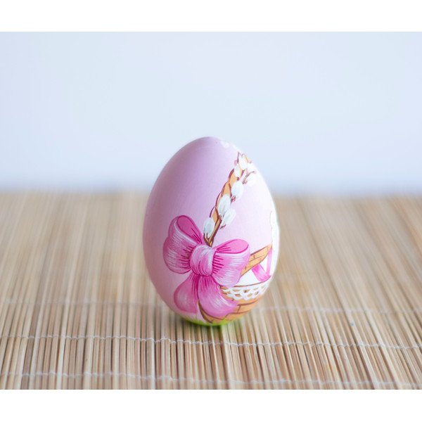 Easter wooden painted egg pink with a baby bunny