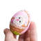 Easter painted egg pink with a baby bunny