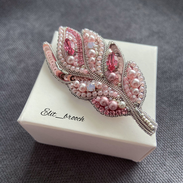 Pink feather with pearls