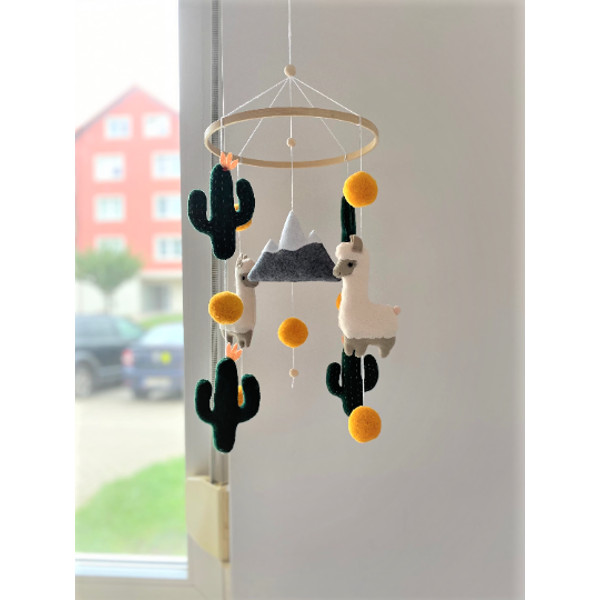 Cactus hanging baby mobile.png