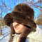 Brown faux fur mouton bucket hat.