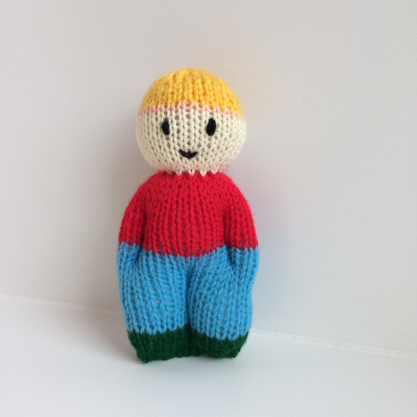 Little boy doll knitting