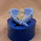 Baby on angel wings soap front