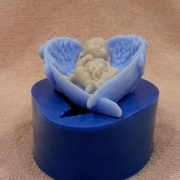 Baby on angel wings soap front