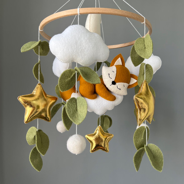 baby mobile with fox on the cloud