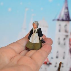 Miniature doll in the 48th scale. Grandmother for a dollhouse.