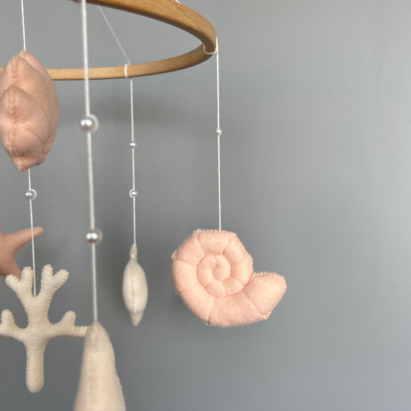 baby mobile with seashell