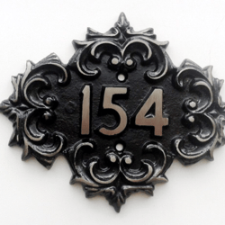 Old fashioned cast iron address number sign 154 door plaque vintage