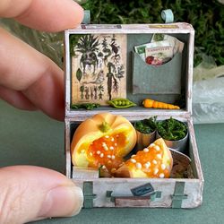 Miniature doll suitcase with pumpkin for playing in a dollhouse, scale 1:12, polymer plastic