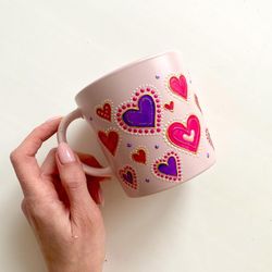 Pink ceramic mug with hearts