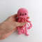 Pink crochet jellyfish amigurumi in the hand 6.jpg