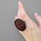 Brown wood, round ring, ring on hand, brown ring,