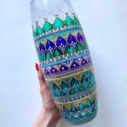 Glass vase with hand painted pattern